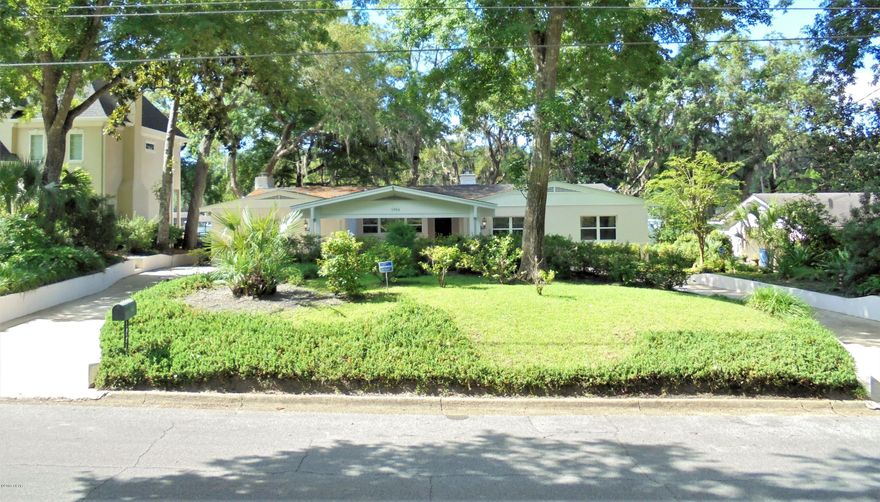 Living is easy in this generously spacious 4 bedrooms, 3 bath residence with views of and access to Watson Bayou in the prestigious Cove area of Panama City. You'll enjoy a perfect setting for relaxing and entertaining. There is plenty of room to spread out for study, sleep and storage. The updated kitchen flows to the cozy breakfast area. Enjoy gatherings in the generously-sized living room. Host family get togethers in the large formal dining room which features a fireplace, built-in bookshelves and wet bar. Glass doors in the Florida room showcase views while opening the home up to even more light and air and spilling out onto the awe-inspiring rear deck with views of Watson Bayou. The master bedroom, complete with walk-in closet and ensuite, ensures parents have their own private space. The 2nd master bedroom is perfect for guests and offers its own private ensuite. There is a hall bath conveniently located next to the other bedrooms.

The property is very high with great views across Watson Bayou. Enjoy fishing from the dock and boathouse. Deep water access perfect for a quick trip to Shell Island, an easy cruise to a nearby restaurant or spontaneous fishing trip.

Just a few doors away are the peaceful surroundings of Lannie Rowe Park. Cove shopping center is within easy walking distance. The home is surrounded by some of the most unique and attractive homes in the Cove. Roof was replaced in 2013, kitchen was updated in 2017, rear deck was redone & stained in 2017, all new windows, and plumbing has been updated. Sconces in the living room DO NOT convey. All info and measurements are approx. and must be verified by Buyers if important.