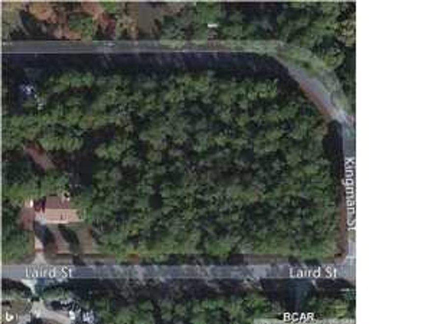 This lot combined is one of the largest and most centrally located lots on the beach. The property is within minutes of the Navy base and all goods and services including banking, grocery stores, medical and automotive. The owner is offering this and neighboring lot at a discount for $180,000 for both. See MLS #632676. The neighborhood is well established.