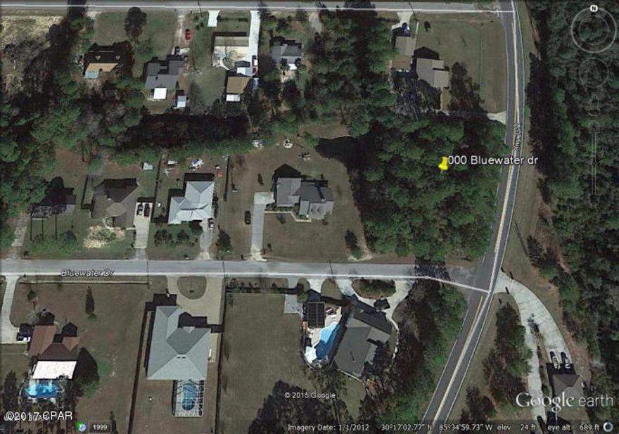 Gorgeous corner lot to build on at Deerpoint Estates. The property is within 1/2 mile of water and has public boat ramp. It is located just down the road from county park and public boat ramp leading to beautiful Deerpoint Lake! The perfect place to build! This larger than average wooded corner lot is over 1/2 acre with driveway access from both CR 2311 and Bluewater Drive. Perfect location for a circular drive. This gorgeous lot is located in a very nice neighborhood on a restricted subdivision which will increase in value.