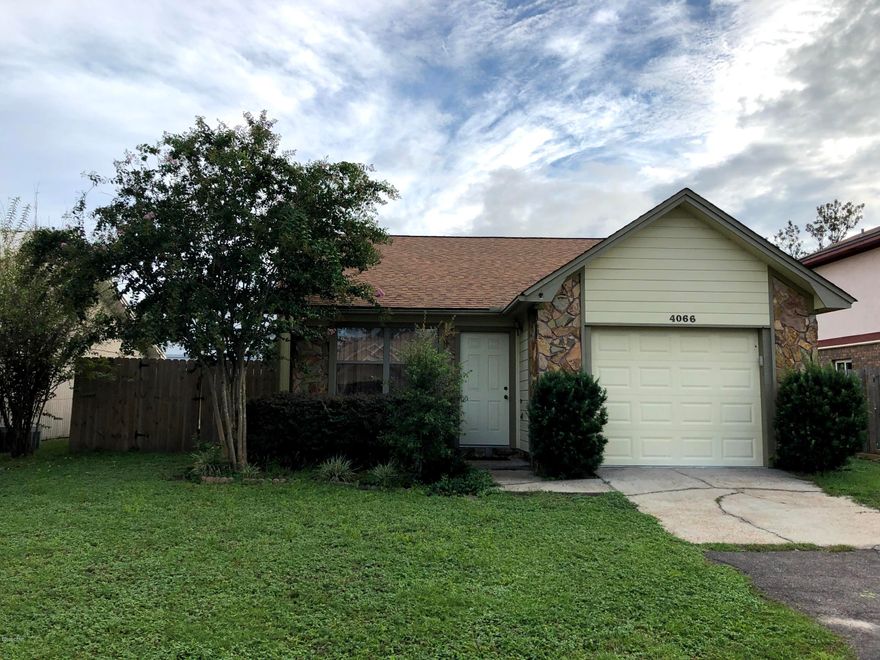 2 Bedroom/2 Bathroom Cash or Conventional Financing Only Sold AS IS Owner will not complete any repairs. - Home features tile flooring throughout with carpet in the bedrooms, living room with stone fireplace accented by mirrors, dining area just off of the living room has sliding doors that lead to the side yard with a deck that's perfect for entertaining, & the back fence is lined with beautiful crape myrtle trees. Great, must-see home!