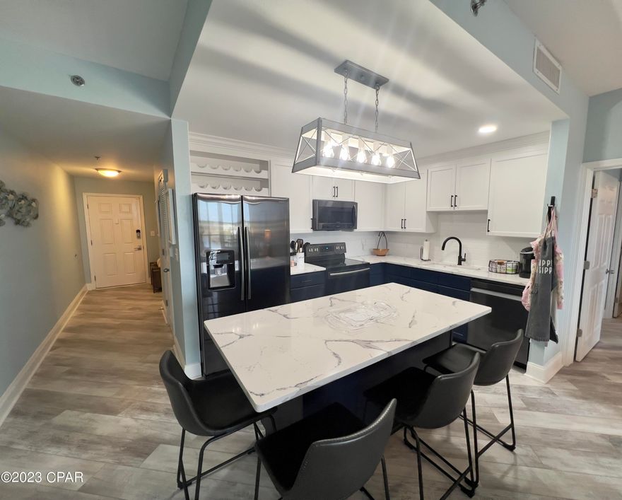 **New Listing** One of the most beautifully upgraded 2 bedroom +bunk room / 2 full bath units at Laketown Wharf. This unit never has to use elevators for access because it is located on the 4th floor and adjacent to the parking garage. Perfect views of the nightly Las Vegas style light show on the lake. Huge balcony for entertaining which includes all polywood furniture (a $5000 value). Inside features all new kitchen, Cambria quartz counters, Blanco granite composite sink, Baths have new comfort height toilets, quiet fans, black faucets & accessories. Custom his and hers master closet system, EVP (Engineered Vinyl Flooring) throughout and fully furnished, rental or private use ready. 

**Currently a Non-Rental Pristine Condition Unit**Come enjoy 5 pools, pickleball, & private beach access