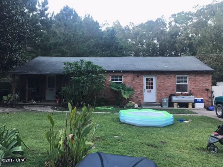 This 3 bedroom 1 bath house has been used as a rental and needs TLC. It consists of two parcels totaling 1 acre. Old bldg on second parcel that needs to be torn down. It is priced accordingly and seller is motivated! Bring ALL Offers!