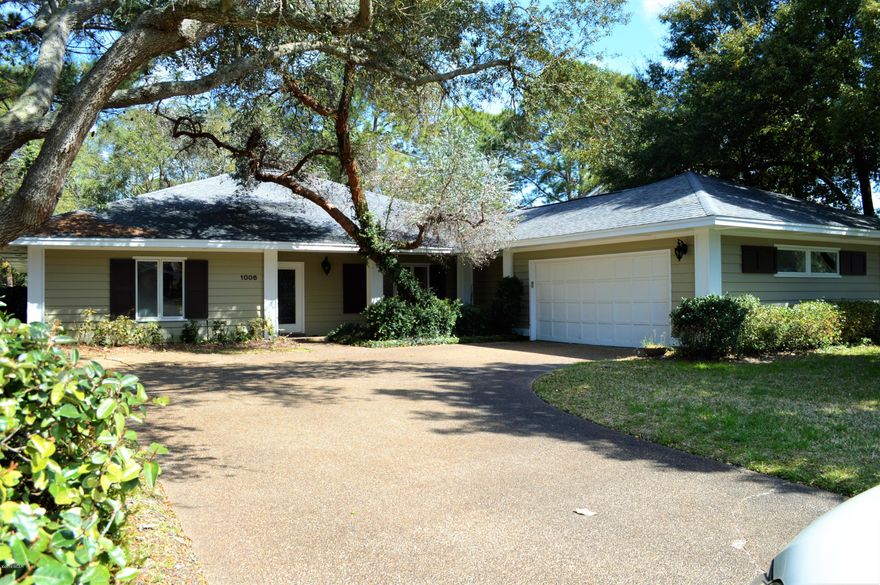 Golf course home in Bay Point!  Great curb appeal with large backyard.  Open and welcoming foyer area opens to spacious family room, adjacent to the kitchen and dining room. Oversized covered porch looks out over live oaks and hole #7 of Meadows Golf Course.  Enjoy quality living on Barracuda Drive, a more private street with a dead end cul de sac, so you have less traffic.  Bay Point is a gated community with great amenities such as a marina, golf, and tennis courts.  Convenient location close to Navy Base, dining, grocery stores, the beach and boating, and all Panama City Beach has to offer!   Call today!