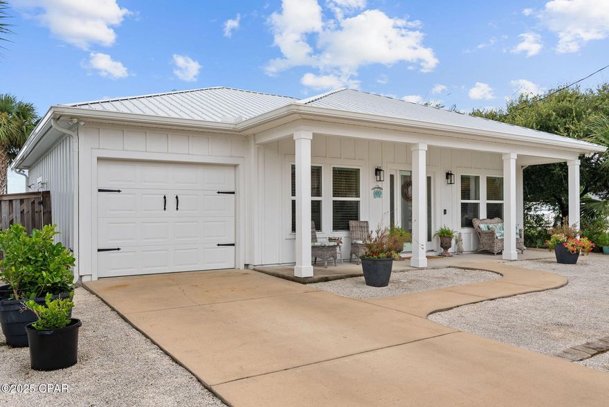 Coastal luxury meets thoughtful design. Custom Built by renowned local builder Tom Ledman, this professionally designed 2-bedroom, 2.5-bath home is straight out of Southern Living Magazine. Featuring 9-ft ceilings and tile flooring throughout, every inch of this residence reflects timeless elegance and relaxed beach living.
The spacious open-concept layout includes a large, beautifully designed kitchen with ample cabinetry, generous counter space, and a dedicated dining area—perfect for hosting friends or enjoying quiet meals at home. Entertaining flows effortlessly into the bright living area and out to the screened-in porch with ceiling fans, paver patio, and outdoor shower.
The primary suite features a walk-in closet and spa-style bathroom with a large walk-in shower and a heated exhaust fan. The second bedroom also has its own private en-suite with a deep jetted soaking tub and built-in heater fan for added comfort. Guests enjoy a separate half bath, offering privacy and convenience.
Additional highlights include a fully finished, drywalled garage, full gutter system, and professionally selected finishes by a renowned interior designer. This home is move-in ready and ideally located less than 1 block from the white-sand beaches.