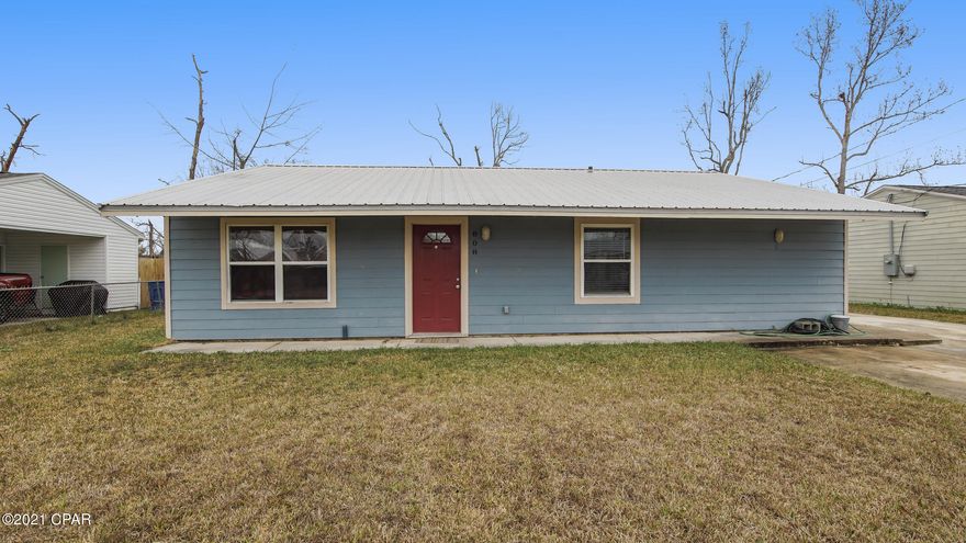 Cute, centrally located, ranch style home on a nice sized lot. This home has a metal roof, spacious living room, and galley style kitchen. The backyard is privacy fenced with a covered porch, huge open decks, yard building for extra storage, double gated access and plenty of driveway for RV , boats and several cars!