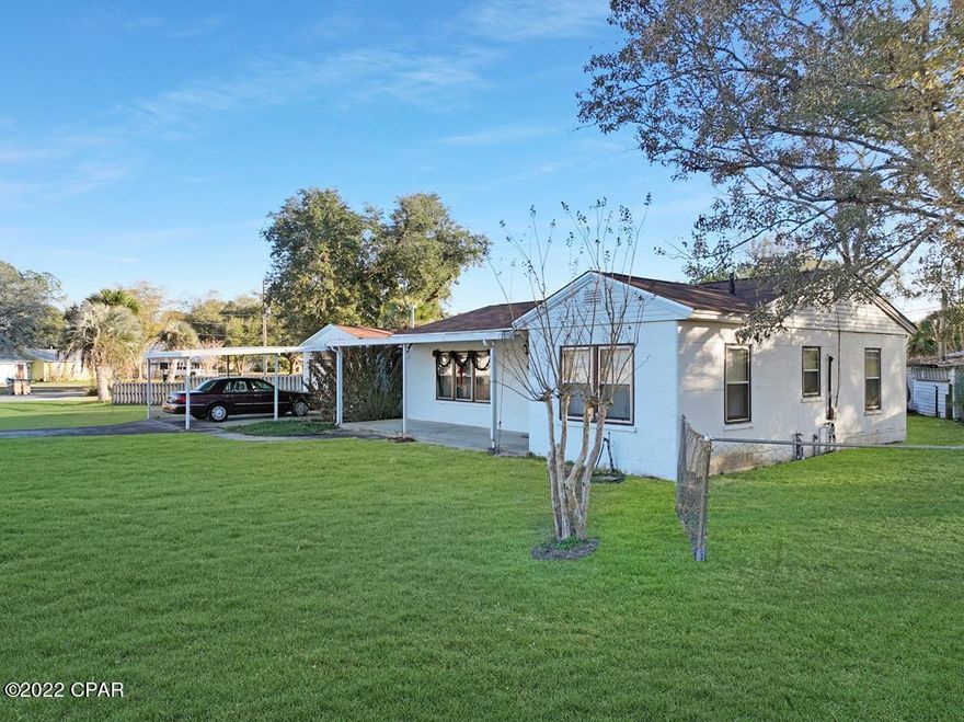 COZY 3BR/2BA FLORIDA COTTAGE MINUTES TO WATER ACCESS & ST JOSEPH BAY! Built to stand the test of time is this endearing family home nicely kept w/original kitchen cabinetry, large pantry & modern appliances. Separate dining & living areas are ideal for family gatherings along w/a sunroom overlooking the backyard for added lounge space. All on one level is the primary suite & 2 guest rooms w/shared hall BA. Enjoy covered parking along with an attached workshop. Mature trees add shade to the fenced backyard & second entryway to the pole barn for boat storage. Near the town center, golf cart transportation is all you need to visit area businesses for restaurants, shopping & entertainment. No HOA dues or restrictions apply & no flood insurance required. Take the 3D tour & call for a showing!