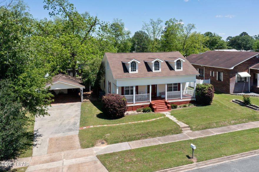 This historic southern home has been impeccably cared for and is now ready for a new family! Full of charm inside and out this 3 bedroom, 2.5 bath features over 2100 sq ft and boasts 12ft ceilings, detailed crown molding, formal living/dining room, spacious kitchen with an abundance of cabinetry and a picturesque view of the backyard. The main level also includes 2 bedrooms, 2 full baths and a family room. Upstairs boasts a 17x22 bonus room (currently used as a bedroom) and ½ bath. Outside you will find an attached carport with storage shed, covered front and back porches and fenced backyard. Property is a short drive to Dothan, Marianna and Hwy 231.