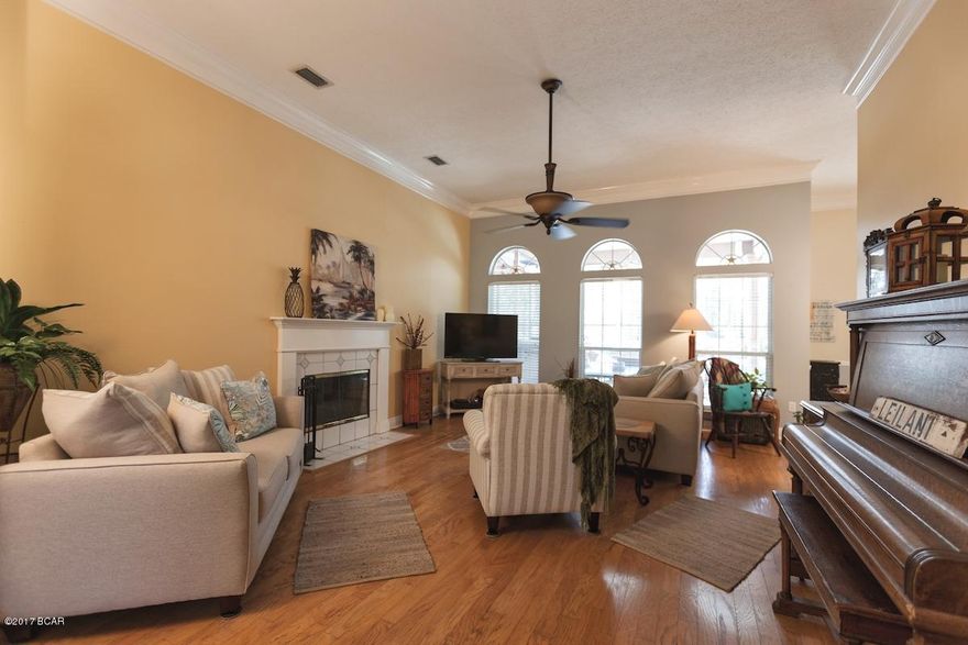 Magnificent, custom built Bay Point home overlooking the #2 and #17 fairways on Bay Point's prestigious Meadows Golf Course.  This three bedroom, two bathroom home with a heated pool and spa is immaculately maintained both inside and out.  Pride of ownership is exhibited in every facet of this home. This home has an open floor plan with a split bedroom design.  There are architectural columns in the foyer leading into a wide and expansive living room with a wood burning fireplace.  The kitchen is a chef's paradise with quartz countertops, custom backsplash, breakfast bar, dining area with bay window facing the pool, and ample cabinets and storage space.  The pantry has custom built  drawers. The main living areas have 12 foot ceilings, and there are hardwood floors in the living room and ceramic tile in the kitchen and dining area.
The master bedroom suite includes a master bath with a jacuzzi tub, lighted Florida glass, separate shower with two shower heads, dual his and hers vanities, and dual his and hers closets.  Both guest bedrooms and private bathroom are located on the opposite side of the home as the master bedroom for ultimate privacy.  The guest bedrooms have new porcelain tile flooring.  The two bay garage is oversized, 22 ft. x 30 ft., has a built-in workbench, and is large enough for two vehicles and extra storage.  One of the most appealing features of this home is an enclosed lanai with heated pool, heated spa, outdoor kitchen with sink, two Weber grills, refrigerators, outdoor speakers, and Coolaroo blinds to keep the outside entertainment area cool and comfortable.  The lanai is one of the largest enclosures in it's class and provides an expansive view of the Meadows Golf Course.  A few of the many great features of this home includes a newer roof (2010), completely tiled pool and patio area, lush landscaping which includes lemon, lime, orange, grapefruit, olive, and fig trees, completely fenced in back yard, new energy efficient windows in guest bedrooms, 12-inch crown molding, and quartz countertops in the master bathroom, guest bathroom, and kitchen.  New lawn laid in 2012.  Bosch washer, dryer, dishwasher, and tankless water heater all convey with sale.  There is an existing golf membership that can be transferred to the buyer.  One has to see this home to truly appreciate all of the wonderful features that it has to offer.  Schedule your showing now!