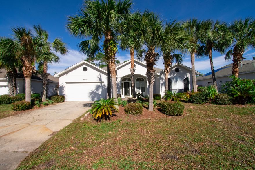 Well maintained, ready to move in home in the coveted Palm Bay Subdivision. Enter the tiled foyer with 12 ft. ceilings, crown molding, that leads you through an arch that flows into the family room that has built in bookcases and entertainment center, with gas fireplace. Then into a very user friendly large kitchen with lots of cabinet space and plenty of counter space, for  the most discerning cooks. Arches identify the dining room that could easily seat eight. The additional bedrooms are both oversized and share a very large hall bath.  Master suite features two separate closets, a huge walk in closet and a tiled bath that has separate his and her vanities, large whirlpool tub, and a separate tiled shower.  Also features a spacious lanai and office that leads out the the pool oasis.