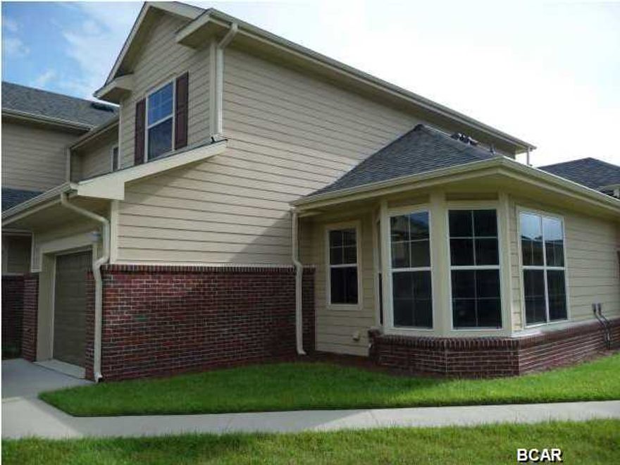 Baldwin Rowe townhome. This is a gated community, Two story with the master on the 1st floor. Views to the lake. It has two separate heat pumps, one upstairs and one downstairs. It has a garden tub, hardwood floors a screened porch and a single car garage.