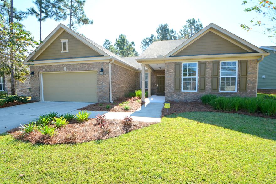 Don't hesitate! Fantastic opportunity in the desirable Hawks Landing subdivision with this four bedroom, three and a half bath home.  This home has a wonderful open floor plan that is so perfect for entertaining. Beautiful wood floors accent the enormous great room, formal dining room as well as a breakfast area and kitchen. The kitchen features granite counters, lots of cabinets, pantry and all appliances. The master suite is also very spacious, the two additional bedrooms share a jack & jill bath and the upstairs room has a full bath as well. The back yard is fully fenced and features a covered porch and paver patio. The neighborhood has underground utilities & sidewalks and is convenient to shopping and schools and, of course, the world's most beautiful beaches. Call your Realtor!