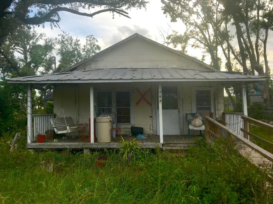 AMAZING fix & flip or investment opportunity with this 2 Bedroom / 1 Bath home in Panama City! The home is It is 680 sqft. (heated) and 1,094 sqft. (total) on a HUGE LOT that could easily be divided into 2 lots! The home did have damage from Hurricane Michael and will require some work - roof, interior, etc. - But at this price and lot size, it is a great opportunity to make it your own! This property WON'T LAST LONG - So act quickly! --- CASH BUYERS ONLY ---