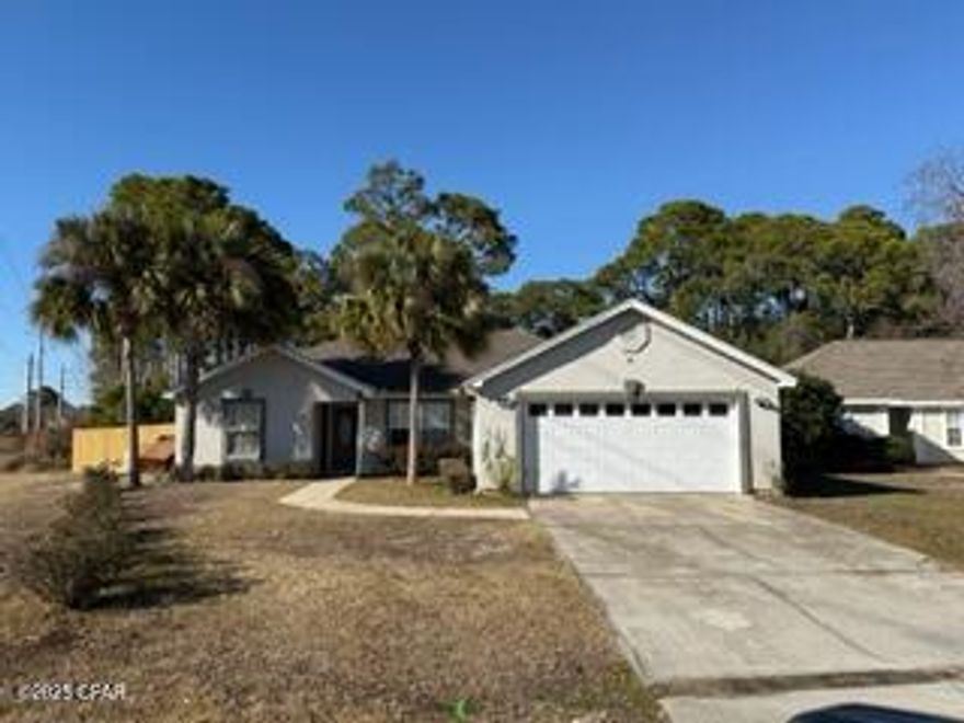 East End of Panama City Beach - Close to the Navy Base.  This fantastic home in Hidden Pines is located on the East End of Panama City Beach features a split 3 bedroom plan to include vaulted ceilings in the great room with fire place, large formal dining room, tiled foyer, master bath with garden tub plus separate wshower with Walk-in closet in mater suite, formal dining room, covered back patio and fenced back yard.  Short distance to Patronis Elementary, the beach, shopping and dining.