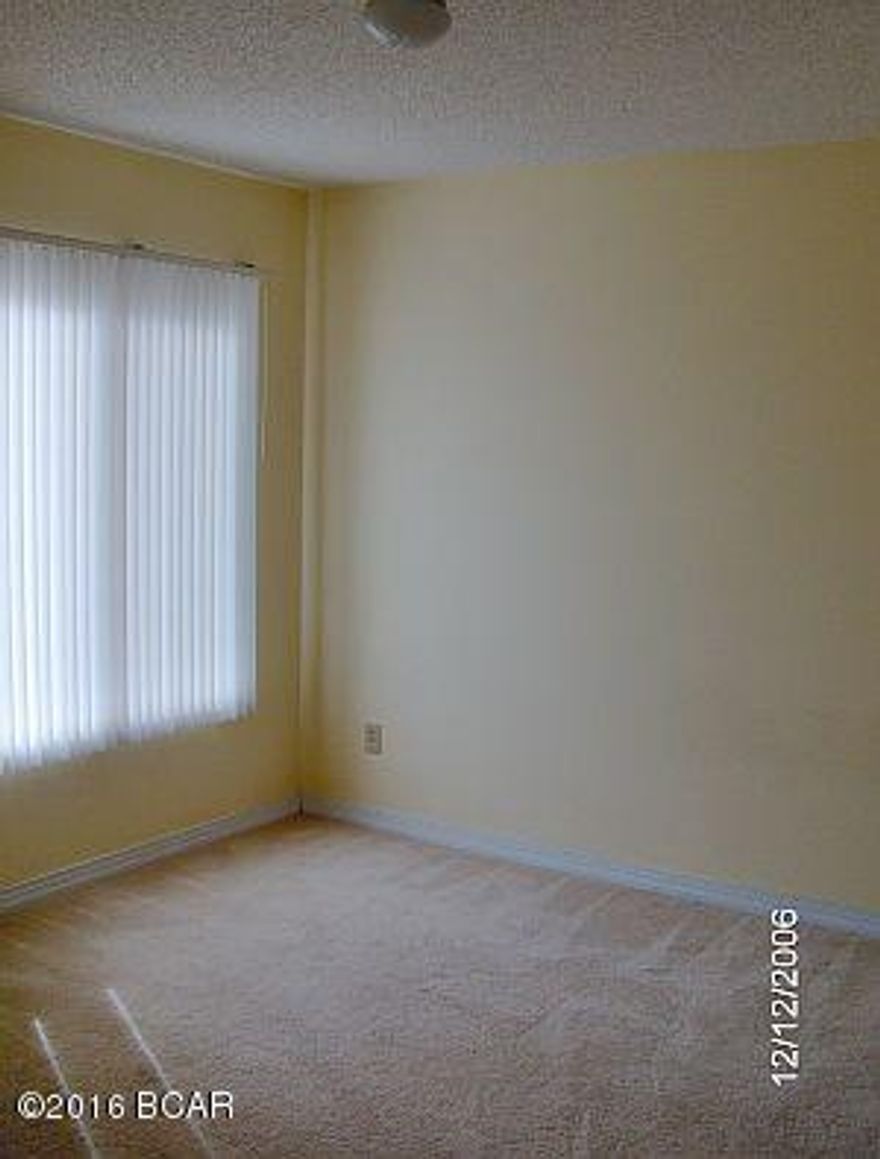 Very nice home with 2 fireplaces, 2-car garage, ceramic tile and carpet, vaulted ceiling, breakfast bar, deck and skylights. Close to Tyndall AFB, shopping and schools.