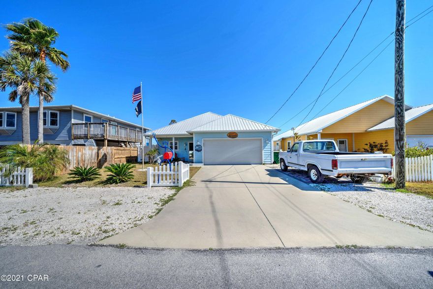 Immaculate Craftmanship home built in 2015 and blocks/walking distance from the beach across Thomas Drive.   Biltmore Beach/Beach Drive is a highly desirable area due to close proximity to the beach and zoned for VRBO/Air B&B.  Home still has the new look feeling.  As you are walking into the entrance, you are greeted by a large kitchen with breakfast bar/Island.  All stainless steel and granite counters. Great floor plan overlooking the family room.  Custom built and fully enclosed Florida Room adding the extra square footage.  Large Master bath with both bedrooms being spacious.  Exterior of home comes with a custom built workshop and extra hobby shed.  This home has it all with comfort and great location. Sprinkler system on well water and outside shower. Neighborhood is golf cart friendly. Outside shower and sprinkler system connected to shallow well.  Only several blocks from Beach Drive is the public boat ramp for your boating and jet skis on South Lagoon, thus taking you out to the Gulf.  Kayaking, paddle boating is waiting for you at the Dolphin Drive Public Ramp