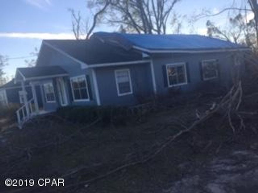 3 bedroom, 1 bathroom home across the street from Compass Lake that was badly damaged from Hurricane Michael. Major roof, ceiling, mold damage and other repairs to be done.
