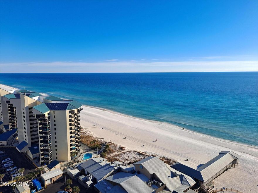 This unit 1925 at Shores of Panama Beach Resort has been renovated to include comfort and beauty and provides endless opportunities for relaxing by the Gulf! When you enter the unit you will already begin to feel relaxed when viewing the mesmerizing coastal views!  Once inside the unit you have amazing views from the Master bedroom and the Kitchen living area!  This is the perfect sunset spot too as you can lounge on your couch or poly wood loungers on your own private balcony and watch the amazing sunsets Panama City Beach Offers!  Having the Master bedroom and a bunk area with 2 full bathrooms provides ample room for up to 6 guests. The bunk area has a full bunk on the lower and is enclosed by a sliding barn door providing you or your guests even more privacy!  This condo boasts new flooring throughout, shiplap walls, smooth ceilings, granite countertops, washer/dryer stack. Don't miss the opportunity to make this your home or rental investment and enjoy basking in the indoor/outdoor pools, hot tub, or utilize the fitness center onsite.  There is 24 hour security and beach access!  The Shores of Panama is also located near so many dining options and fun activities! Check this one out it's really turnkey and ready for you!  Fully furnished!  You will also have a dedicated parking spot labeled 1925 and it's located on the 10th floor.  During peak season there will be tiki food snacks, beverages, bar, and also inside you will find more snacks, along with ice cream shop!