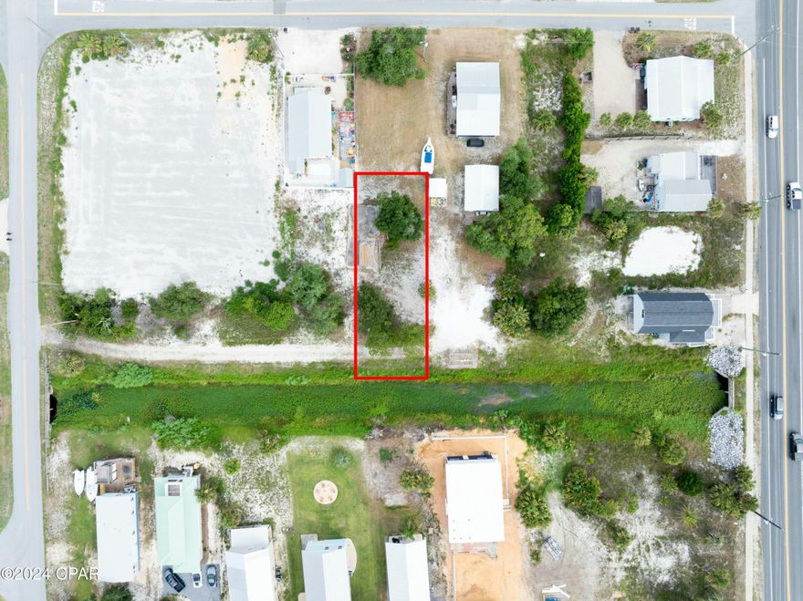 Imagine building your dream beach house or an investment property just steps away from the pristine white sandy beaches and blue waters of the Gulf of Mexico, where daily sunsets are nothing short of spectacular! This prime lot is situated in the highly sought-after gulf front community of St. Joe Beach, nestled between Mexico Beach and Port St. Joe, FL. Located within the first block from the waters edge, this property could offer breathtaking gulf views from a second story home. (Builder's plans are available). The property is also adorned with healthy, mature trees, including palms, live oaks and pines, thoughtfully preserved to complement a future home. The owners have completed and paid for all inspections, architectural and engineering drawings, builder's plans plus the boring tests for the required pilings, totalling over $11,000. A new owner will NOT incur these out-of-pocket costs! An elevation certificate and survey are available upon request and essential utilities are on-site for connection such as power, water, sewer and natural gas. This prime area of Gulf County offers a variety of attractions, shops, dining and more in the nearby communities of Windmark, Port St. Joe, Cape San Blas, Apalachicola, and the captivating St. Joseph State Park. Seize the opportunity to create a coastal paradise or to generate lucrative rental revenue in this idyllic location. Schedule your in-person or virtual preview today! Parcel boundaries and dimensions are approximate, please verify if important.