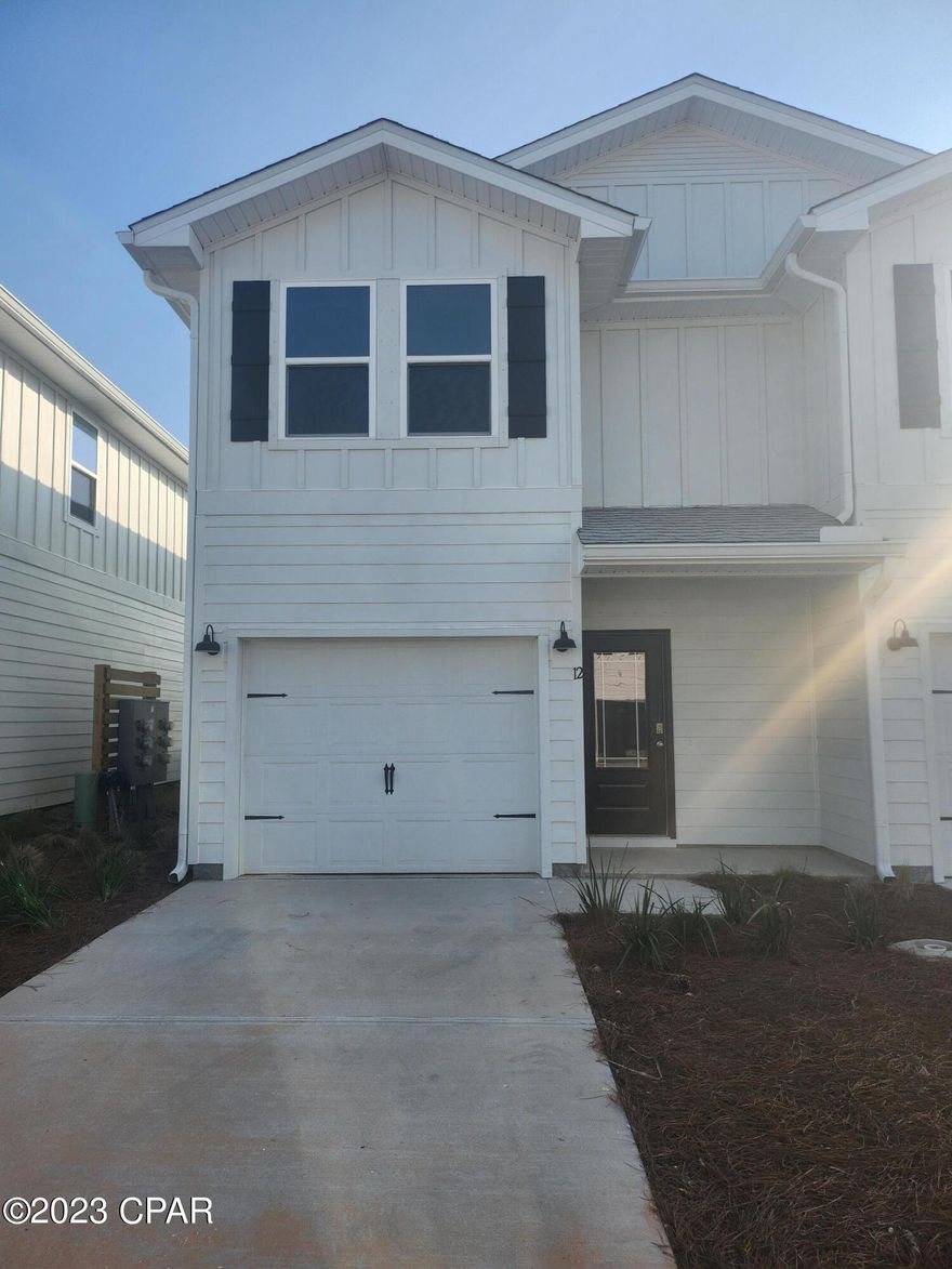 Townhome available at Harbor Place townhomes. This home features three bedrooms, two and a half baths and one car garage.  Pearl EVP flooring throughout, wood stair treads, kitchen farm sink, Quartz countertops, frameless shower doors, & 12x24 shower tiles!