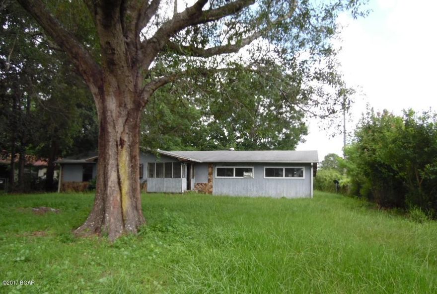 Investor Opportunity near Holmes Creek Community. Home is a 3 bedroom 2 bath with enclosed garage that is now a den. Large mostly fenced in yard. Sold As-Is. Owner Occupant purchases will be reviewed after 8 days on MLS. Investor purchases will be reviewed after 21 days on MLS.