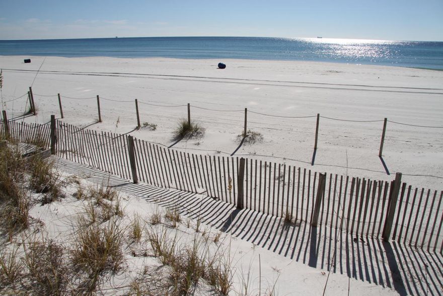 Have you always wanted to rent a nice quiet condo on the beach LONG-TERM?  HERE IT IS!!! Partially furnished unit is GULF FRONT.  Cozy but great views.  Perfect for long-term rental - Pelican Walk is a quiet condo resort on the east end of the beach - close to restaurants, Navy base, St Andrews St Park.  This one bedroom unit is partially furnished, has two full baths, and a balcony overlooking the Gulf of Mexico.