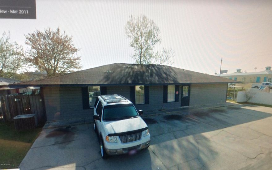 Building heavily damaged by hurricane Michael. Being sold as is.