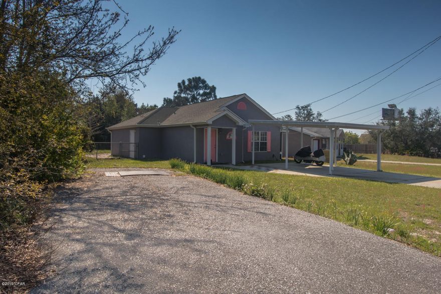 ~~Under contract but accepting back up offers~~This 2 bedroom 2 bath home is move in ready. Extra Parking for a motor home or boat. No HOA, High ceilings, Tray ceiling in master bedroom.  Screened porch off the dining room.Just North of Hwy 98 but, a short stroll to the beach. Open floor plan with raised ceilings. Located very close to Walton county, Hwy 79 and or Pier Park.