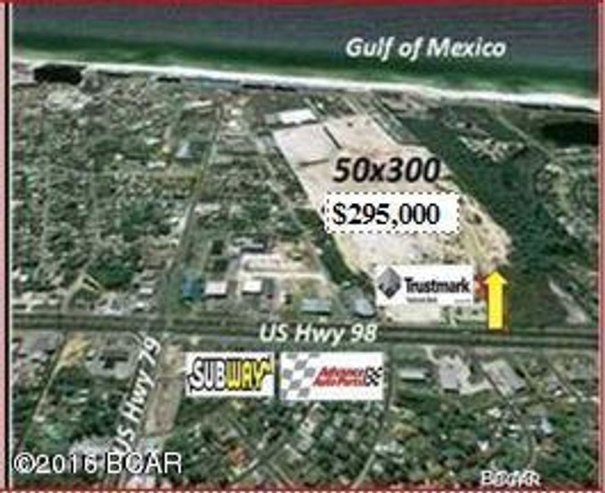 BACK ON MARKET, PRICE REDUCTION!!! ESTATE OUT OF PROBATE, MUST SELL! 50 FT. OF PRIME US HWY 98 EAST FRONTAGE! 1.1 miles from Pier Park, approximately 1,592 feet from US Highway 79 South. Deeded easements. Ingress. Egress. Two points of Access. Ample parking space. Vacant Commercial beside Trustmark Bank located just west of the intersection of Hwy 79, south side of Panama City Beach Parkway / US Hwy 98 (Back Beach Road). Three (3) zoning classifications, T-3 Comm. R-1 Residential, and BA. FDOT reports in peak of the tourist season (March - September +70,000 vehicles per day average). This property would be excellent for professional office buildings. mini-warehouses, restaurant, or residential / townhomes, or hold as an investment. There is an easement for the buyer to use a portion of Trustmark National Bank parking lot for the buyers customers. Dimensions are approximate and should be verified by buyer. Within 1/2 mile of Gulf of Mexico. Possible view of the gulf with vertical construction, build up.
