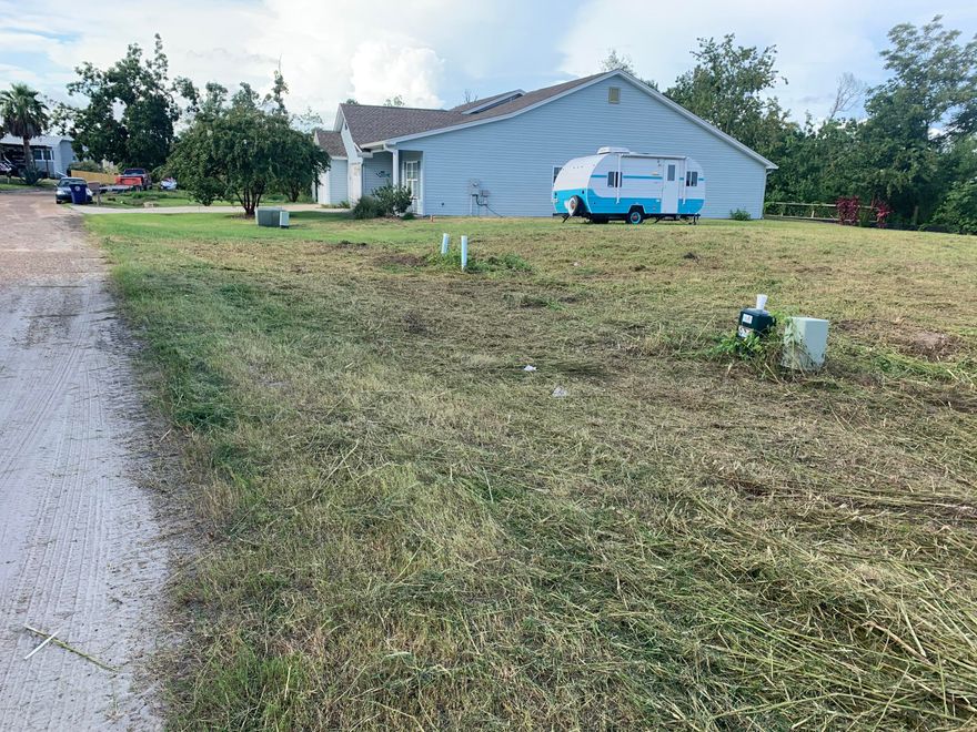 This property is zoned Mix Use-3. Seller has 4 sewer and storm water run off installed for townhouse or duplex use. The property has high elevation and is cleared and ready to build. It also has 144' +/ - waterfront on Lake Caroline. Realtor has copy of original property plat showing locations of sewer, water and storm water grates in office.