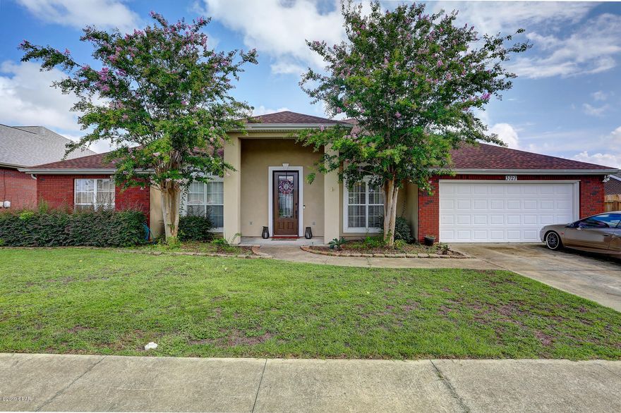 Currently under contract, seller taking back up offers. Excellent split floor plan with master bedroom and HUGE master bath on one side of the house, And 3 bedrooms and 2 bathrooms on the other. The kitchen has stainless appliances, and solid surface counters with an eat-in kitchen. The formal dining room and formal living room up front provide ample extra space. Enjoy the fireplace from the touch of a button, and the spacious screened back porch year round. The back yard has a new privacy fence. Beautiful wood floors located in the living room and bedrooms. Enjoy all that the quiet community of The Hammocks has to offer, including a community pool! All measurements are approximate, and must be verified by the buyer if important.