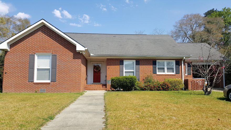 Gorgeous city home is MOVE IN READY! Enter the foyer to find a home that feels like it's meant to be yours. You will love the separate dining area and large living room. The eat-in kitchen has an abundance of white cabinets and a breakfast nook with beautiful glass front cabinets. Features of the home include new windows, hardwood flooring, updated electrical, large master bedroom with full bath, gutters, large screened in back porch, carport, and paved driveway. Come take a look and make this your new home.