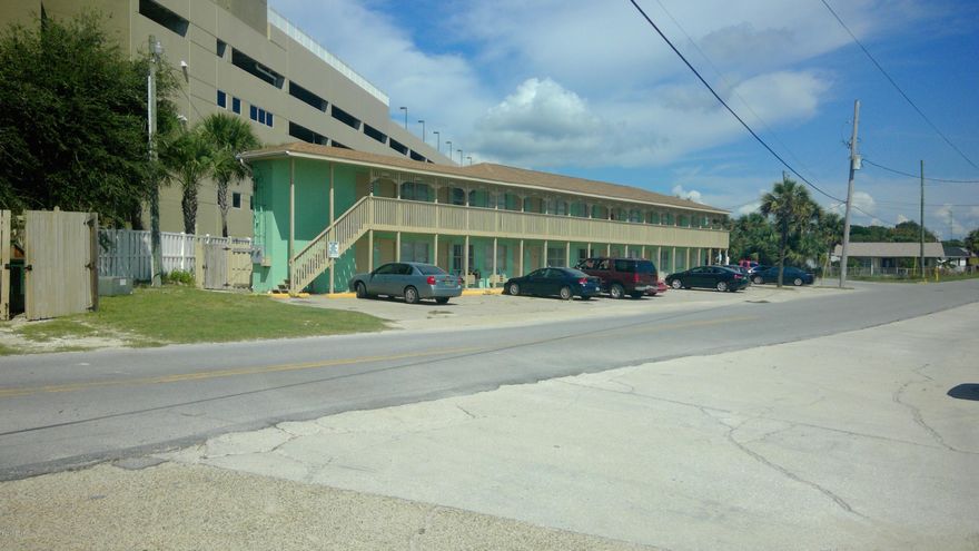 Property is currently being managed as a apartment complex and completely rented.  Potential is unlimited, as the property is just right across the street from the gulf and  the property could be managed as a short term rental facility (hotel style) or can be converted to a condo and sold off separately. The property consist of 28 1 & 2 bedroom units with a laundry and check in office facility.  Current Financials can be provided with a NCND