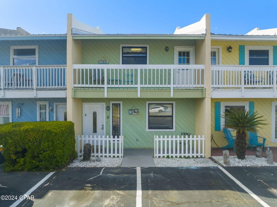 If you are looking for an investment or home away from home, this is the perfect fit that allows short term rentals. This 2 story attached single unit is located on the east end of PCB on Thomas Drive in Dune Crest with only 9 units. It is just a short distance to the beach with low HOA that includes cable, trash, water, pool, groundskeeping, and 2 assigned parking spaces right out your front door. This fully furnished home has 2 bedrooms and 2 full baths located on the main floor with access to your private fenced in patio, perfect for sunsets and grilling and also pet friendly. Upstairs you will find your main living area, kitchen, half bath, and 2 balconies with access to the downstairs fenced in patio. Perfectly located near St Andrews state park, great local seafood restaurants, and shopping. This unit is ready for summer!