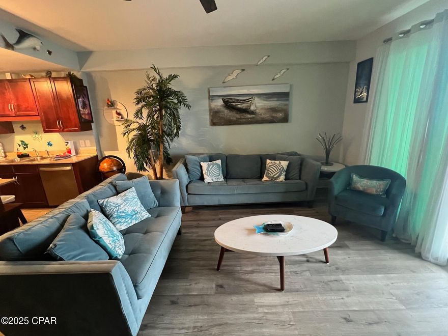 Welcome to your next home or investment retreat. Laketown wharf is known for its spacious units, great amenities and convenience to everything you need for a great vacation getaway. This init is on the same floor as your parking garage access, which will save you and your guests time from those elevator wait times!Inside you will see nice updates,premium furniture,all major appliances including fridge and stacked washer & dryer and fresh decorations and clean paint throughout. This move in ready units is completely rental ready and is sold completely furnished! COA dues are paid quarterly and are among the most affordable on the beach. COA Dues include INSURANCE, Cable, Internet/WIFI, Water, Garbage, Mail Service, and all-access to property amenities, including 5 pools, pickleball court, boardwalk with restaurants and shopping, gated and security. Coded Gated Beach access, 2 parking garages. Truly a must see unit.