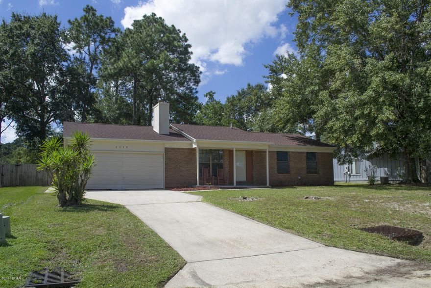 Cute 3 bedroom 2 bath home located in Greentree Heights.Close to schools, shopping and central to both military bases, Tyndall AFB and NSA Panama City.This home is move in ready,new roof,HVAC recently replaced and completely remodeled kitchen.When you enter the home there is a cozy gas fireplace, all new paint, remodeled kitchen and a room off the kitchen that can be used either as a dining room or a 4th bedroom, has a closet.New HVAC a two car garage and a huge backyard fully fenced. Very well priced will not last long, make an appointment today!!