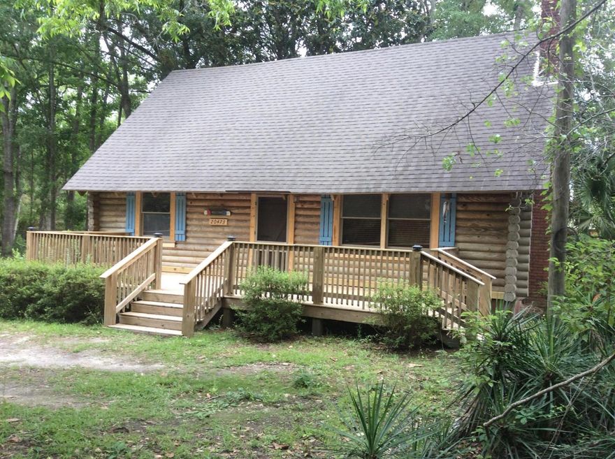 Log cabin living in town! Cozy up to the fireplace or sip your coffee on the front deck or back deck. It is a 2 bedroom (1 in loft area) 1.5 bath home. This place is perfect for a retirement or beginner home. It is also close to commercial area and may be able to be zoned for commercial use!
