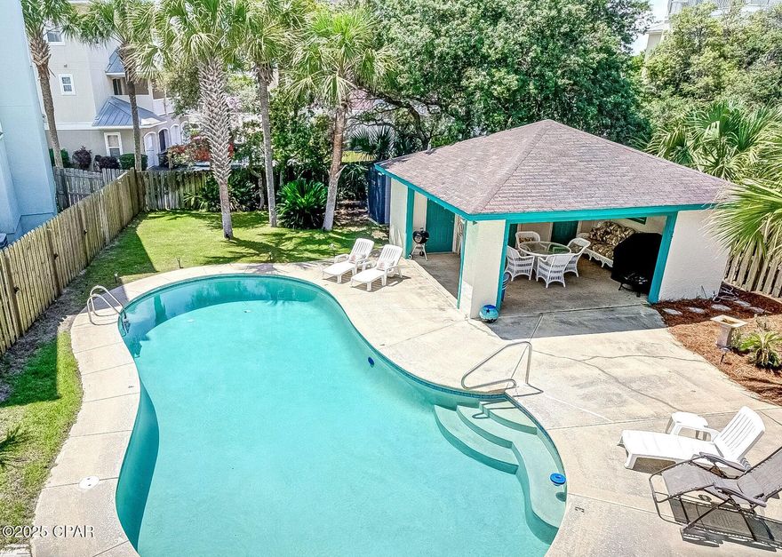 This charming cottage is the ultimate beach retreat--just a block from our beautiful white sands and tucked away to escape the crowds. Whether you're seeking your own personal getaway, an investment opportunity, or a property with short term rental ability, this one has it all. The home comes fully furnished and ready to go, featuring two spacious king bedrooms, each with its own private bathroom. One of the standout features? Your own private pool and cabana--perfect for those days when you want to cool off without getting sandy. Whether it's a quick dip after the beach or a laid-back afternoon by the water, it is an appreciated feature. A personal storage closet and shed offer additional space for beach supplies and more. Whatever tickles your fancy, this location delivers! You're just minutes from the luxury and charm of 30A--without the 30A price tag. Prefer a livelier vibe? Pier Park is only 6 miles, offering shopping, dining, and entertainment in the heart of Panama City Beach. No HOA fees and only three owners in the building. Owners share expenses for common areas, keeping things simple and cost-effective. The building has just been updated to public sewer access (no more septic!) and new electrical boxes. Turnkey ready for living or renting. Just hand over the keys and move right in! Measurements approximate, buyer to verify if important.