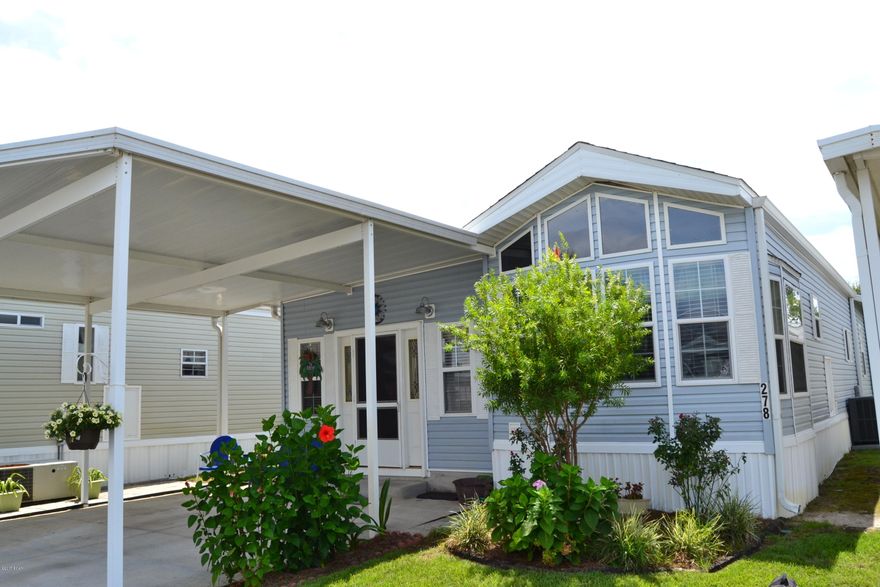 This gorgeous 3/2 in Emerald Pointe. Has been carefully updated and meticulously maintained. New Kitchen Counter tops and Backsplash. Newer appliances,and flooring. A/C and W/H (1 1/2 yr old) Crown molding. Track and Pendant lighting. Carpet in the bedrooms. If you are looking for a better unit, you may not find one. All appliances convey with sale. Emerald Pointe is a gated resort community located 2 miles from the Beach. Close to Entertainment and St Andrews State Park. This family friendly community is perfect for biking, strolling & skating. The amenities at Emerald Pointe include 2 pools (one heated), hot tub, shuffle board, horseshoes, a fishing pond (catch & release), a large clubhouse with kitchen & big screen TV and a playground. Call today for your private showing This unit also has a 95 Sq. Ft Shop attached that could be used for storage or a workroom.