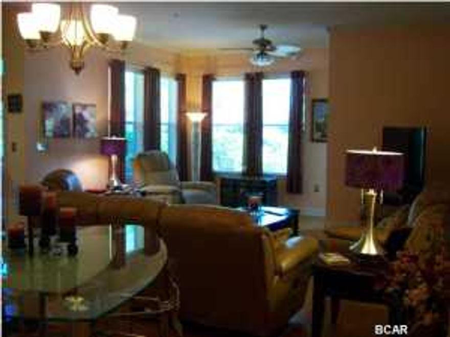 Absolutely Beautiful Ground Floor, CORNER unit. 3 bedroom 2 1/2 bath, featuring stainless appliances, granite counters, bamboo and tile flooring through out, with Brand new HVAC system, and new dish washer, loads of cupboards, and closets. Wonderful end unit close to parking for convenience. Kitchen isle and recessed lighting.Huge pool with waterfall, lap swimming and zero entry. Lovely L shaped porch. This home has too many designer touches to mention and list! The grounds and courtyards are lush and peaceful. Parking garage location allows for easy access to your home. Lowest priced 3 bedroom in the complex! This fantastic home is an absolute must see! Don't miss the best opportunity in Island Reserve. Assoc.Fees Include: Accounting, Community Room, Dumpster, Exercise Room, Game