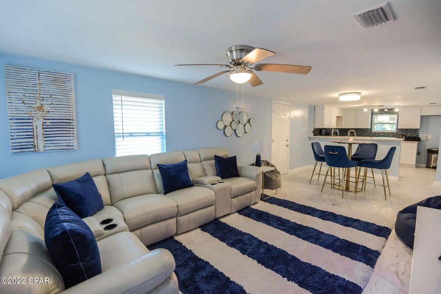 CURRENTLY UNDER CONTRACT, SELLER ACCEPTING BACKUP OFFERS. Welcome home! Don't miss out on the opportunity to own this charming newly renovated home. This home has an open floor plan with new kitchen cabinets/countertops, new roof, new light fixtures throughout, new laminate flooring/carpets and much more. The master bedroom has a freestanding bathtub and a stand alone shower. Conveniently located to schools,Tyndall A.F.B., shopping, restaurants and walking parks. Come check out this move in ready gem.  All information and all measurements are approximate and must be verified.