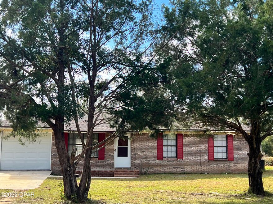 MOVE IN READY!! ADORABLE 3BR/1BATH on a full acre of land with fencing on the back side of the property. The large bathroom opens into the hallway and the Master Bedroom which is very convenient. This home has been renovated and is ready to move in. Quiet neighborhood! This home is a MUST see and priced to sell!