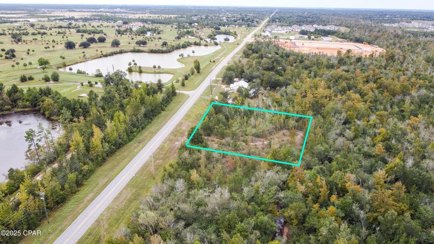 BACK ON MARKET NO FAULT OF SELLERS! Buyers had a change of direction under inspection period. Growing Area finds this 1.02 Acre Parcel with a beautiful running Creek in the back side. PUBLIC SEWER AND WATER AVAILABLE AS WELL AS ELECTRICITY. Just Steps from the H.G. Harder's Recreational Complex. Complex has 5 ball fields, playground for the kids, Lake with park benches and sitting swings a very pleasant park to go take the family or guests. Also, there is development coming up for another park to the West across the street as well as building to the West and East home complexes. This means growth with family-oriented plans and should make for a good equity situation in whatever you decide to build. 
With the Creek you could put tiny homes to place as rentals or build that dream home you have wanted with space to breathe. 
Publix shopping very near and Tyndall AFB not far away at all. Go take a look today! Buyer and Buyers agent to verify all dimensions and anything deemed important.