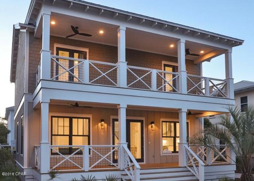 Just completed beautiful brand new, fully furnished and professionally decorated Beach and guest house with a private heated pool just 3 houses from the beach! All you need are your flip flops, tee shirt, and your family and friends to start living the Carillon Beach lifestyle today! From the new coffee pots sitting on the marble countertops to the right out of the box 9 flat screen TV's hanging on the walls this home is 100% ready for your family and/or a terrific investment rental property! Entertain a whole crowd of beach goers - 2 refrigerators 2 dishwashers, 2 professional ranges, 2 family rooms, 3 suites with king beds - some with built in bunks and all with full baths, 2nd floor bunk room, sleep 16 in beds, and so very close to the beach.