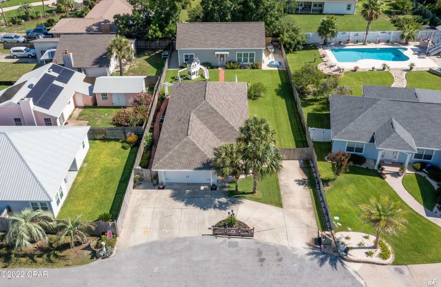 CURRENTLY UNDER CONTRACT, SELLER WILL CONSIDER BACKUP OFFERS Take advantage of the recent PRICE IMPROVEMENT! This property has so much to offer! The main home (3/2 1290sf) has not been lived it since the remodel and is in excellent/like new condition! You will be amazed at the guesthouse/in-law quarters (1/1 1275sf) with 10ft ceilings and an open living space ready to entertain and host guests such as visiting friends and family. There is also extra climate controlled attic storage of 240sf (not included in sq. footage). This is a multi-generational family paradise. Have a college student that needs to move back home, but also needs privacy? Or you need extra space for the in-laws during those extended stays or assisted care. This could be the perfect fit for your housing needs. The outdoor space does not disappoint with a lawn of well kept Zoysia grass and a lovely flower garden that lines the brick pathway that leads to the front door of the guesthouse and a sprinkler system using reclaimed water helps make the watering schedule easy to manage. The backyard is just begging for a pool to be added and if you have toys to store, there is room to park an RV and a boat. And it's all just a short walk or bike ride to the nearby beach access.  Or if you prefer riding a golf cart, there is cart parking right in front of beach access #51 for those quick trips to see the beautiful beach sunset. When you return home, there is an outside shower waiting for you to rinse off the beach sand. Are you are looking for a beach retreat for family and friends? This home is the perfect place to start. 
Call to see this property today and be ready to make an offer!