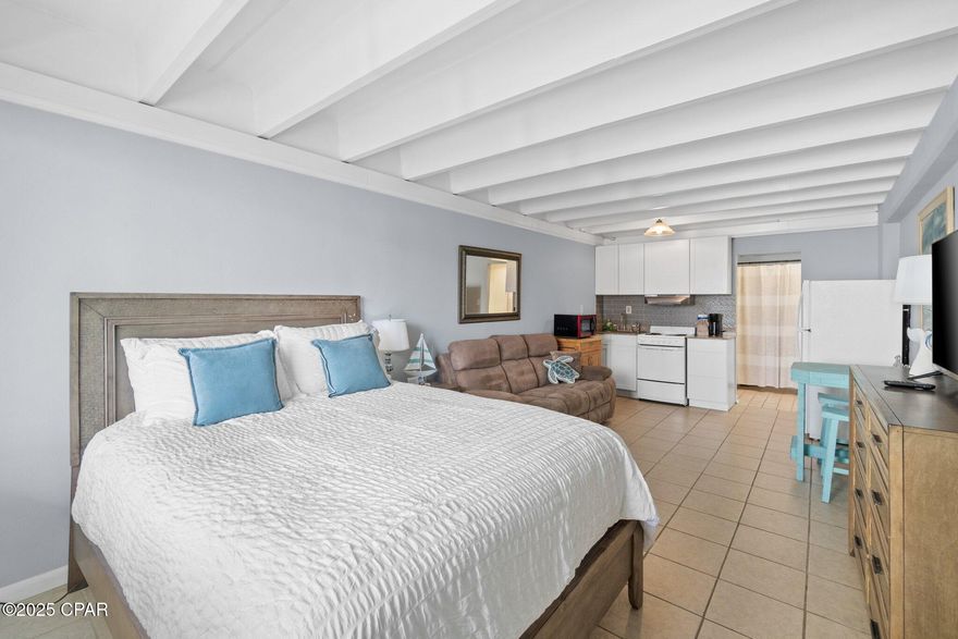 One of the lowest-priced Gulf-front studio investments in Panama City Beach! This is a rare opportunity to own a piece of history at Fontainebleau Terrace, a beloved Gulf-front co-op on the sought-after West End. Unit 301 is ideally positioned with direct Gulf views and the soothing sound of the waves right from your front door.

Located adjacent to Bid-A-Wee Beach—a private, deeded beachfront community—your views are unobstructed and protected from high-rise development, offering endless sights of emerald waters and sugar-white sand from all directions. This turnkey studio comes fully furnished and is ready to perform as a short-term rental or serve as a personal beach retreat. The monthly HOA is truly all-inclusive, covering power, fiber-optic Wi-Fi, water, sewer, garbage, and security.

Fontainebleau Terrace has passed its milestone inspection, confirming structural soundness, and is currently undergoing exciting enhancements that promise a bright and wonderful future for this historical location. Parking is never an issue here, as the property includes a dedicated lot directly across the street to accommodate owners and guests.

Situated just over a mile from Pier Park, there is so much to do nearby, from TopGolf and local attractions to premier dining and shopping. Enjoy on-site amenities including a beachfront pool, private beach access, covered pavilions, and an owners' lounge. The highlights continue with an incredible 5th-floor rooftop deck, offering a panoramic lounge area with views that are truly second to none. Secure your spot on the sand while prices remain accessible in this thriving coastal destination.

Buyer to verify all information and measurements deemed important.