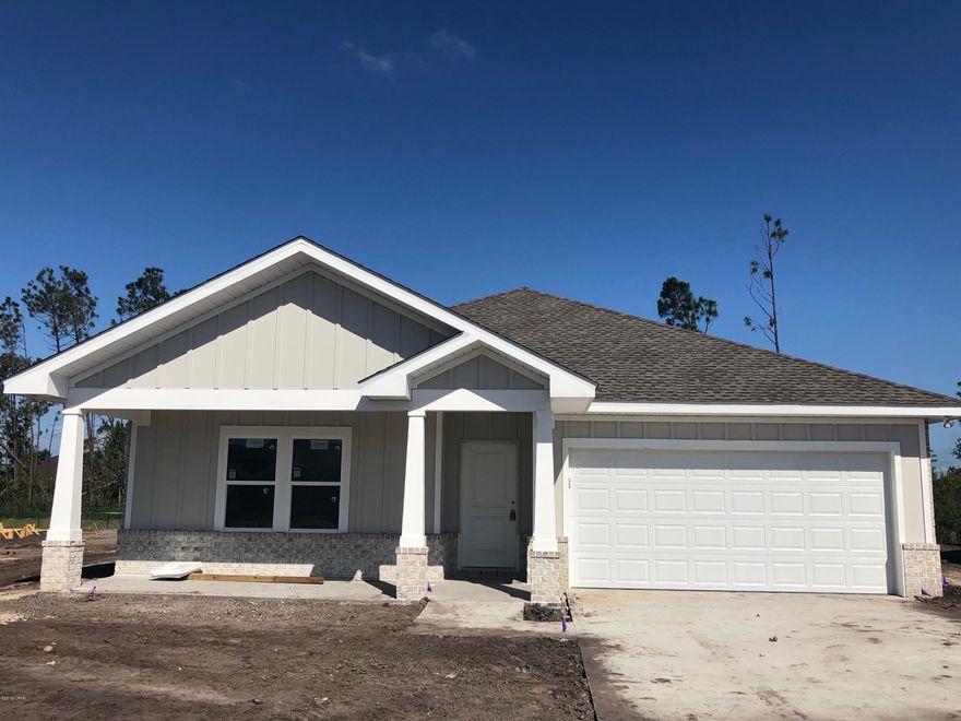 NEW CONSTRUCTION, CAMRYN'S CROSSING II subdivision in Lynn Haven, built by Southern Coastal Homes. INTERIOR features of this coastal inspired home offer a private Foyer entrance that leads to a large Great Room with tray ceiling.  Kitchen with center island, custom cabinetry, & stainless steel appliances leads into dining area and is open to the great room as well. Master Suite has tray ceiling, double vanity, garden tub, and extra-large walk-in closet.  Spacious covered patio just off Great Room makes this home perfect for entertaining.  Cam II offers walking park and playground.



EXTERIOR-This ALL BRICK home features a 2 car garage, covered lanai, covered front porch, fully sodded yard with Rain Bird sprinkler system. This home includes features of the DESIGN BOARD shown in the photos.