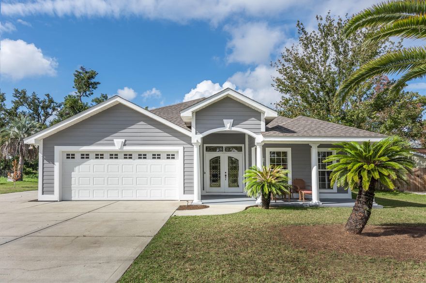 Looking for a place to store ALL your toys?Look no further than this MASSIVE 55' concrete driveway extension on the side of this wonderful Lynn Haven gem!  Plenty of space for a gigantic boat, RV or lots of cars! 

This home has had a new roof put on this summer, full exterior painting, newly painted garage and epoxy garage paint on floor.  The home features beautiful interior features such as wood floors, open floor plan, gas fireplace and custom wood built areas.   The home comes with all appliances, including the high tech LG washer/dryer.  Large lot, with no HOA and a large screened in porch.  Close to everything you want and need but with plenty of space for all your toys!