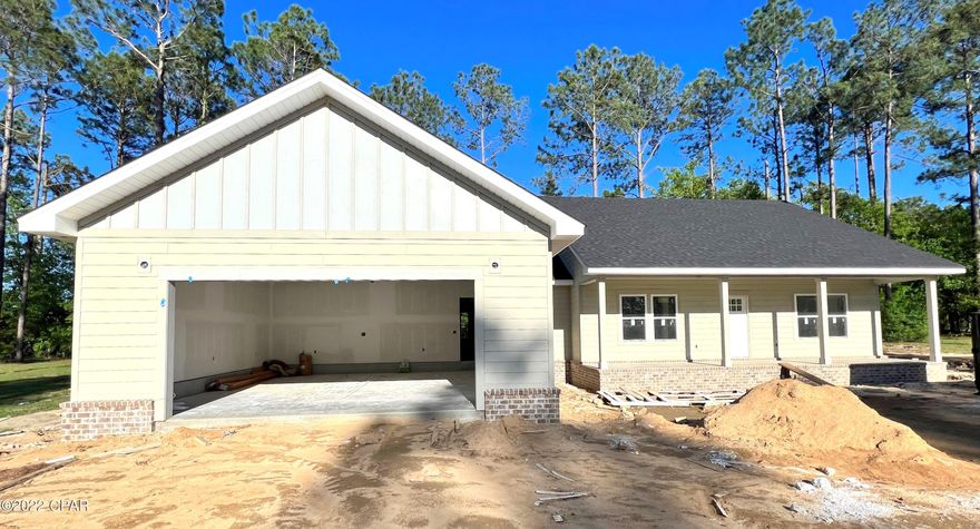 Charming, new construction home located in the highly desirable Martin's Woods! This craftsman style, 3/2 split floor plan features a spacious kitchen with custom cabinetry, granite countertops, island and vinyl plank flooring that flows directly into the living/dining area, laundry room with shelving and a mudroom located directly off the garage. The master suite boasts a large walk-in closet, custom tile shower, separate soaking tub and his/her vanities. Outside features include hardie board siding, covered rear patio and attached 2 car garage. Home is located just minutes from town with available high speed internet and city utilities.