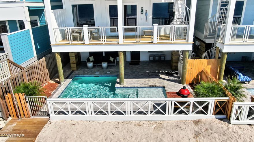 UNDER CONTRACT. SELLER ACCEPTING BACK UP OFFERS. Surf Shack is a brand new 8-bedroom, 8 1/2 bath luxury beachfront home featuring a private pool, walkout balconies on each level, fully equipped kitchen and comfortably sleeps 26 guests. On the beach side of the ground floor is a full kitchenette with an indoor/outdoor serving bar and comfortable lounge area with flatscreen TV along with a full bathroom with large walk-in shower. The backdoor opens up to your very own private beachfront pool with couch lounge seating as well as your outdoor grilling area, and putt putt golf.  Also on this level is a fun filled game area.  The second level features a large beachside living, dining kitchen area with walk out balcony to enjoy the amazing coastal views. Also on this level you will find 2 bedrooms with ensuite baths and a laundry area.
The third level floor features two beachside bedrooms with private balconies overlooking the water,  along with (2) additional bedrooms.  All bedrooms have their own private baths.   

The top floor has a small sitting area just as you come off the stairway. On the North side is a multi-bed room featuring two queen beds and two twin beds (sleeps 6) with an in-room vanity plus a connected full bathroom. On the beach side is a king master suite featuring a large seating area, beautiful en-suite with oversized walkin shower, double vanity and separate claw foot soaking tub. This room also has its own walkout balcony for pristine views of the Emerald Coastline. Make this your own private retreat or let it become an excellent investment opportunity!  Give us a call today to review!