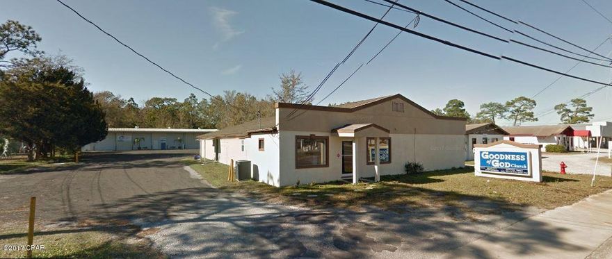 Approximately 6,000 square feet of commercial warehouse space and an additional 4,400 square foot retail/office building.  The warehouse building is currently being repaired and will be available December 1, 2018. Above average improvements, including: 15'+/- ceiling height at eve, four 12' x 12' roll-up bay doors, multiple offices, 2 bathrooms with shower, and much more.  Price is as is and reflects condition of front/office building which has hurricane damage.  Call agent with any questions and to setup a tour.